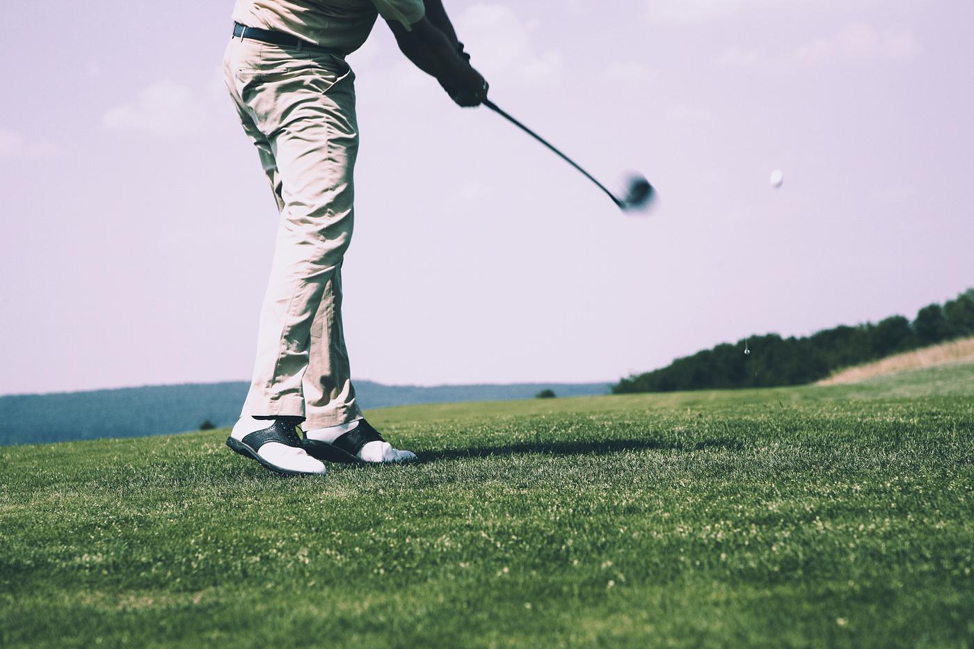 Golfer at a golfcourse Golfer at a golfcourse