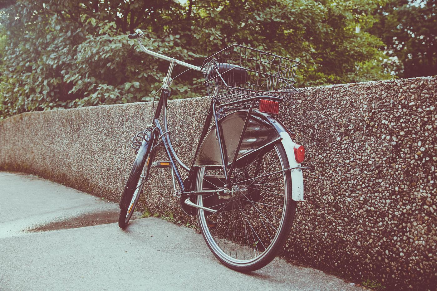 Bike resting on a wall Bike resting on a wall