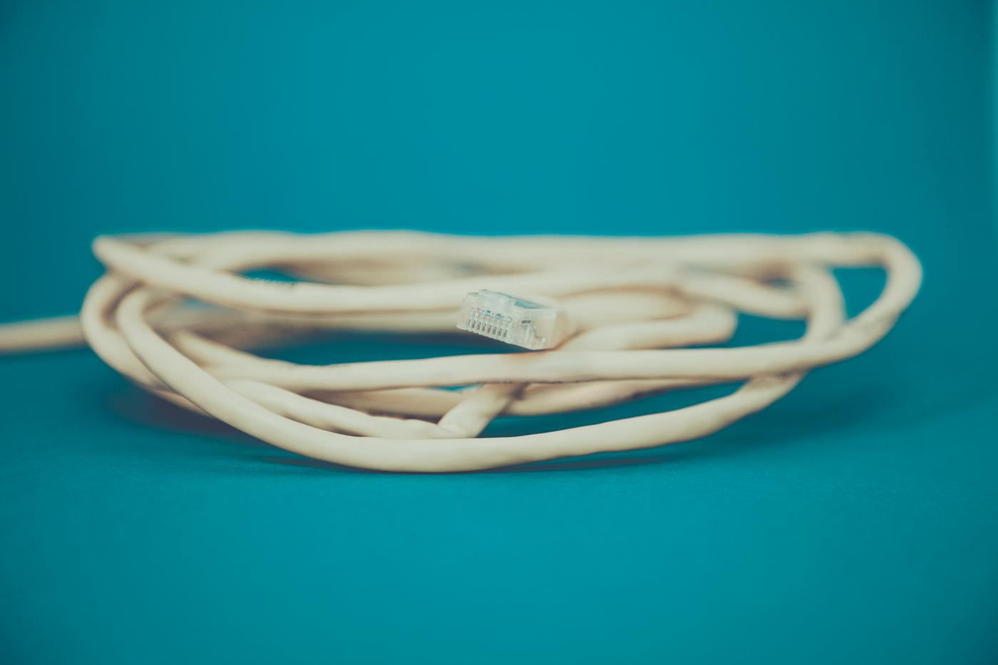Close up of a network connection ethernet cable Close up of a network connection ethernet cable