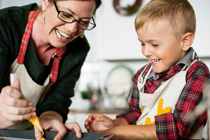 8 Marketing Ideas for Restaurants on Mother's Day 3 Mother and son having fun in the kitchen