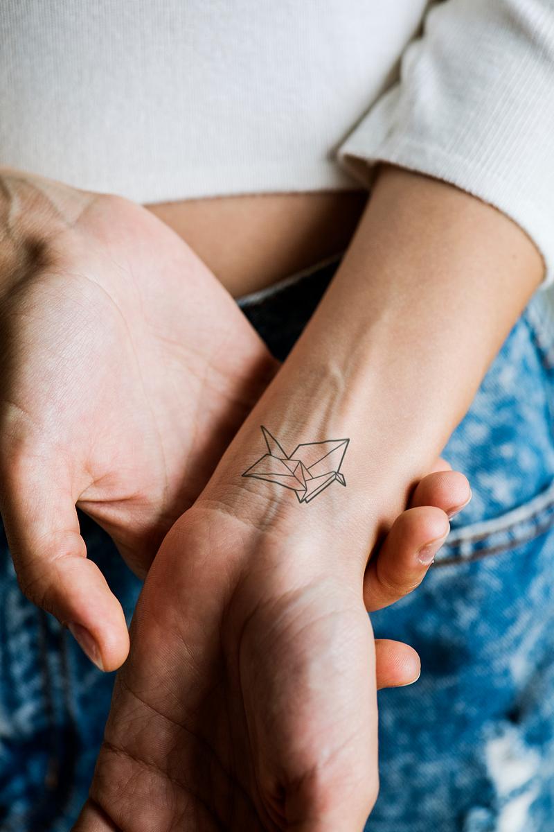 Download Close Up Of Tattoo On The Wrist Of A Woman Royalty Free Stock Psd Mockup High Resolution Design