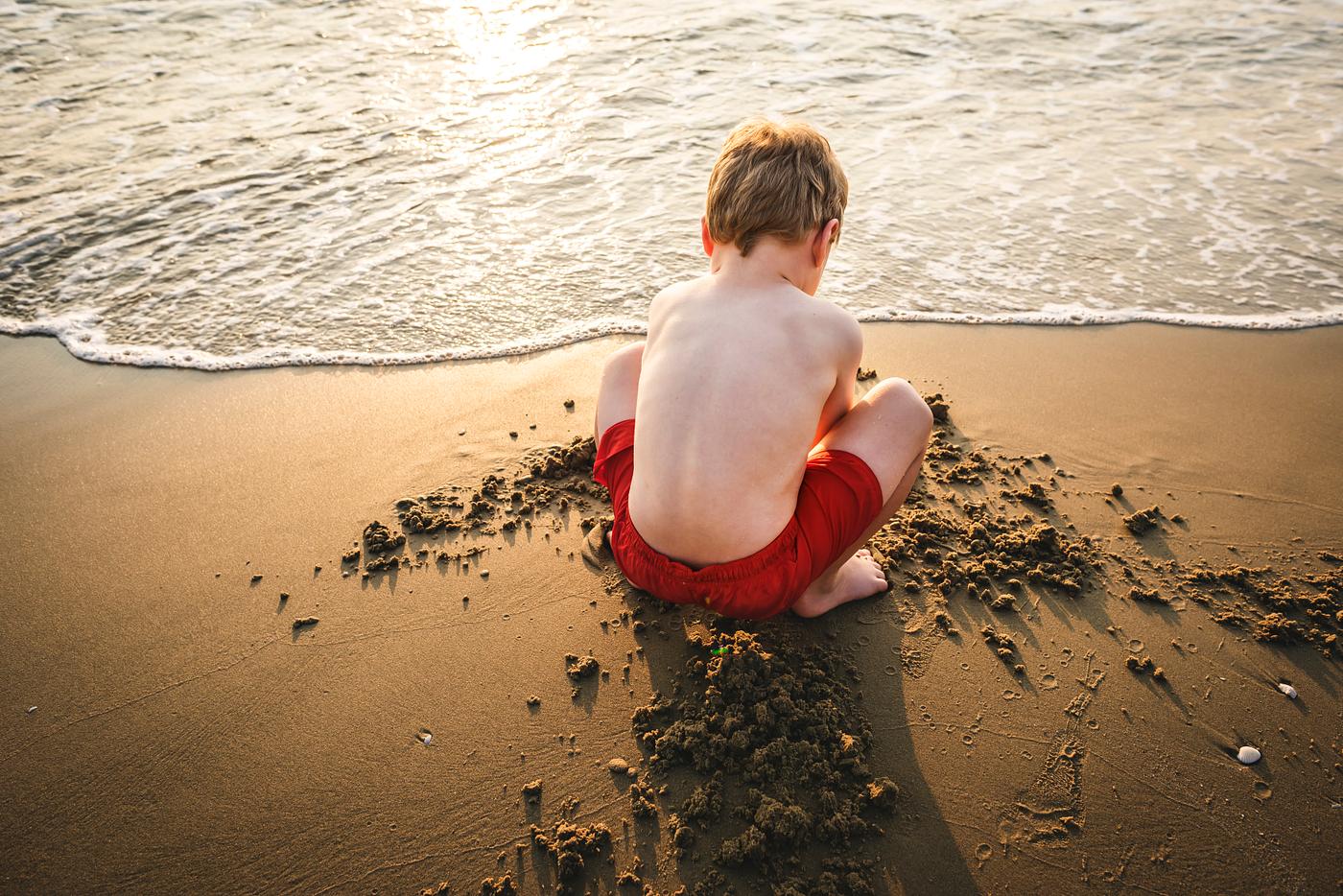 A little boy playing in the sand - summer, kid, child, activity, adorable, beach, boy, castle, childhood, children,... A little boy playing in the sand - summer, kid, child, activity, adorable, beach, boy, castle, childhood, children,...