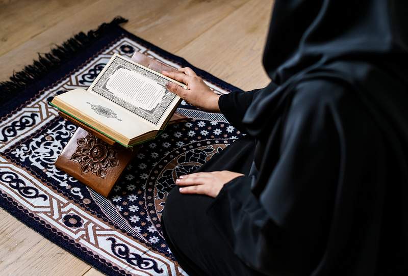 Religious Muslim Woman Reading The Quran Royalty Free Stock Photo dhikr-islam-allah-islam-muslim-islam-quran-quran-quotes-love