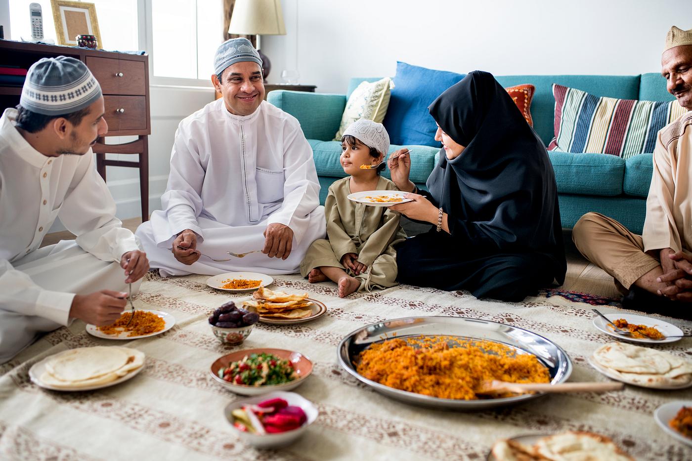 Happy Muslim family eating at home | Royalty free photo - 425873