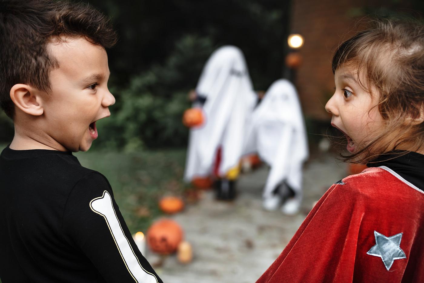 Scared little kids at Halloween Scared little kids at Halloween