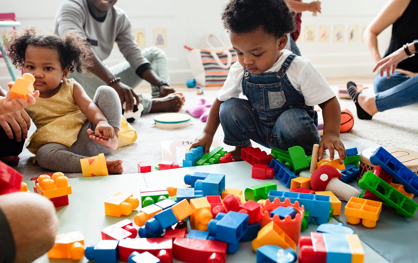 Diverse children enjoying playing with toys Royalty free stock photo Diverse children enjoying playing with toys Royalty free stock photo