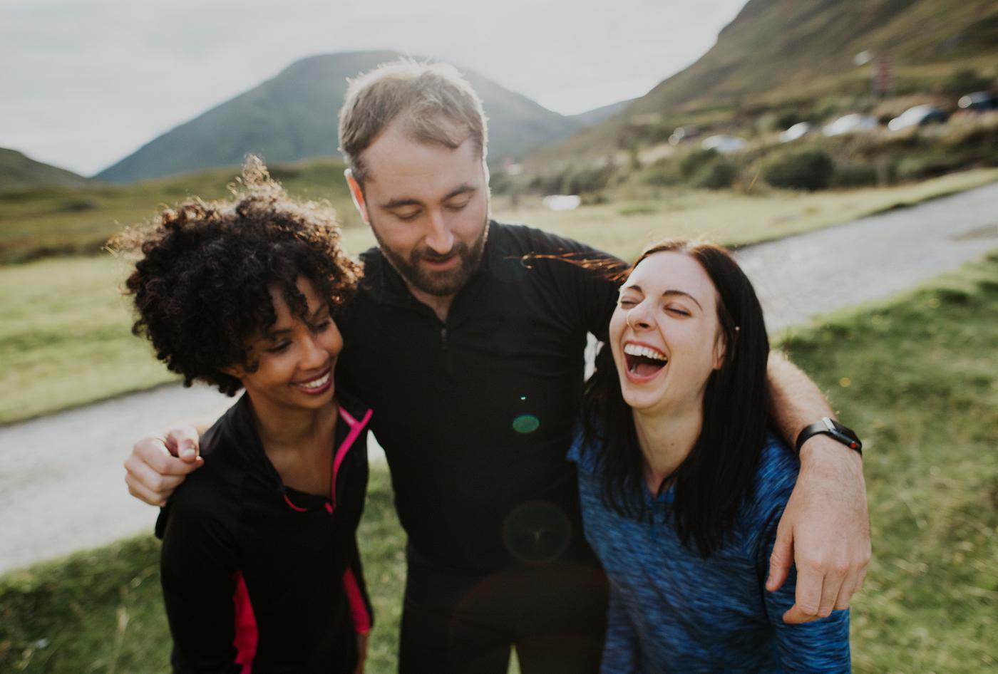 Group of friends resting from a jog - active, african, african descent, arms around, athlete, ballachulish, caucasian,... Group of friends resting from a jog - active, african, african descent, arms around, athlete, ballachulish, caucasian,...