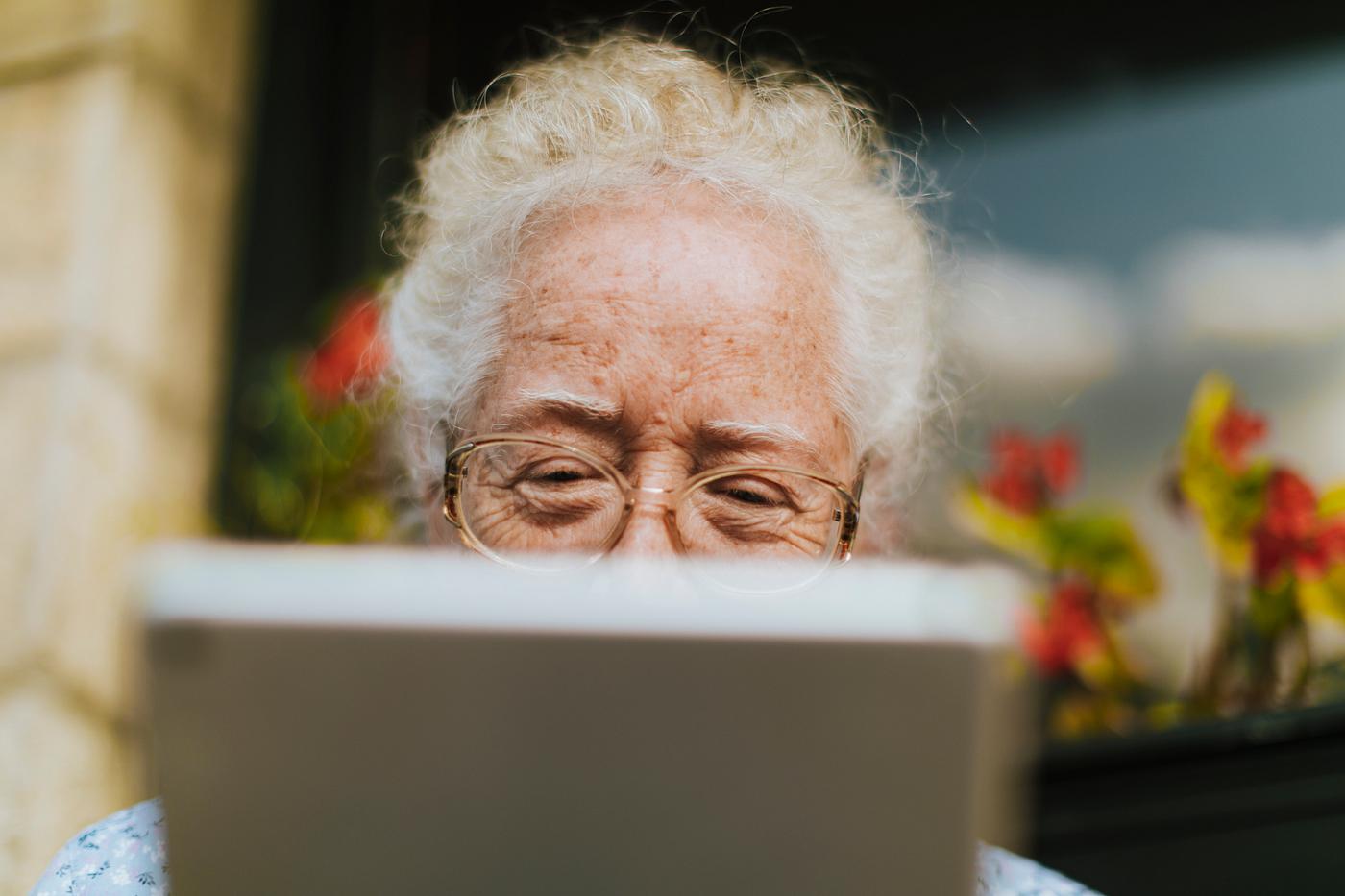 Senior woman using a digital tablet - adult, aged, caucasian, chatting, connected, connection, device, digital, digital... Senior woman using a digital tablet - adult, aged, caucasian, chatting, connected, connection, device, digital, digital...