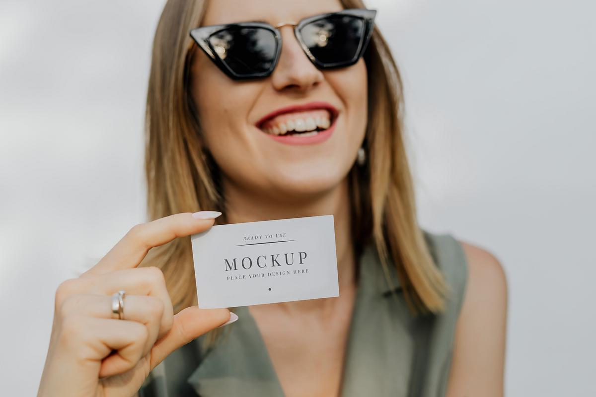 Download Happy Woman With A Business Card Royalty Free Stock Psd Mockup High Resolution Design