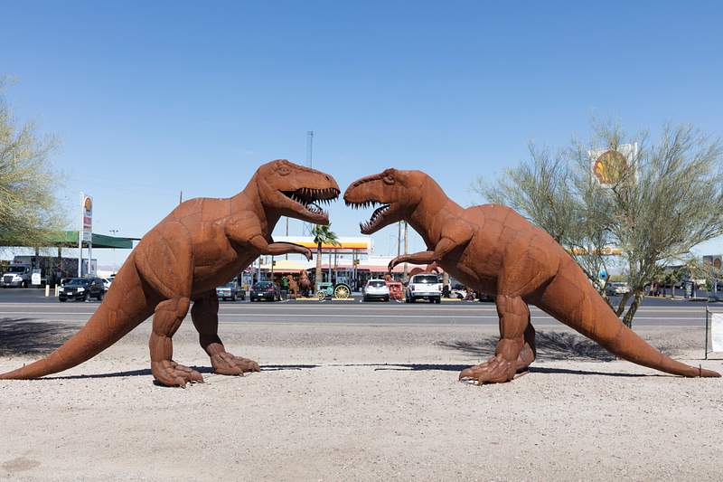 Carol M. Highsmith’s Arizona Photograph | Free public domain photo Two large, ferocious-looking Tyrannosaurus metal-art sculptures face off outside Holt's gas station and gift shop in Gila…