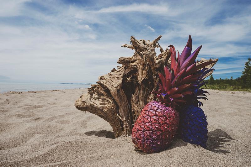 Colorful pineapple on a beach Colorful pineapple on a beach