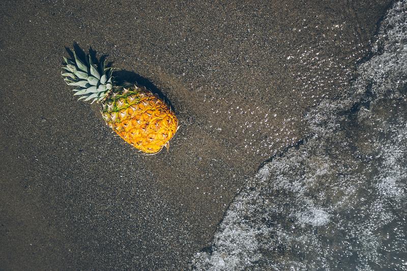 Ripe pineapple on the seashore Ripe pineapple on the seashore