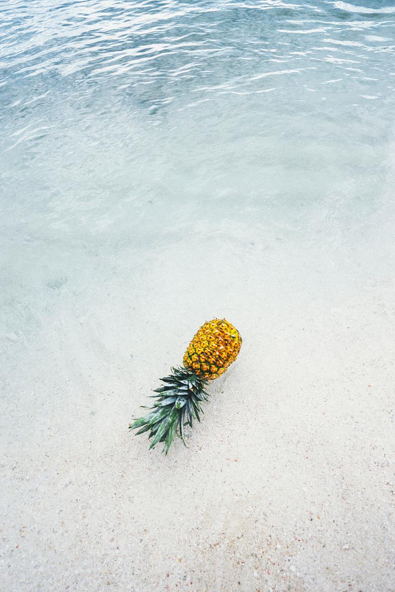 Ripe pineapple on the seashore Ripe pineapple on the seashore