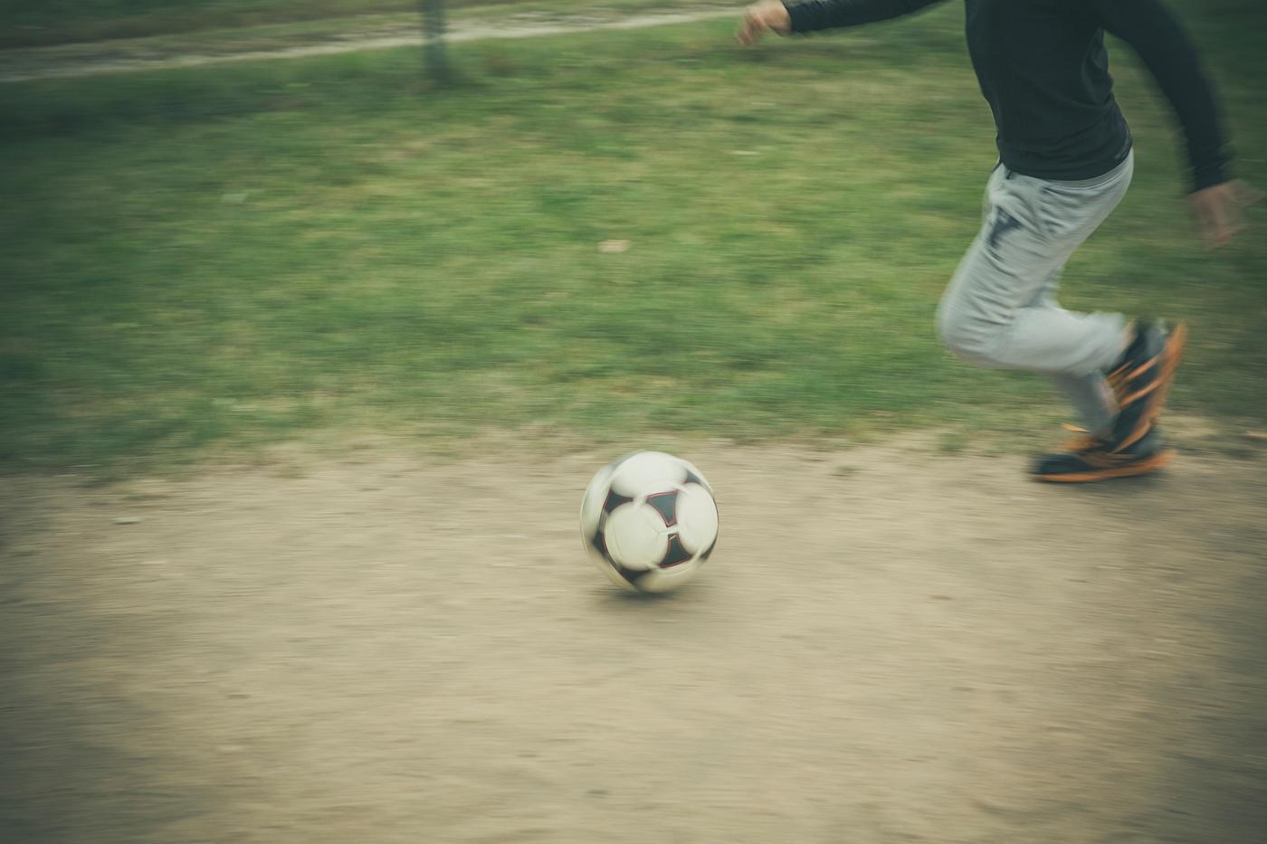 Boy playing football Boy playing football