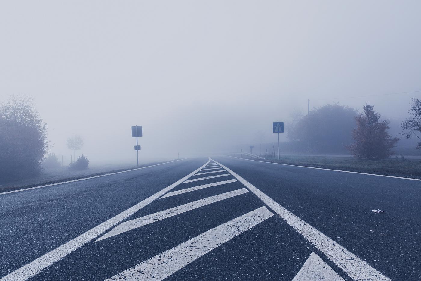 A road in the morning mist A road in the morning mist