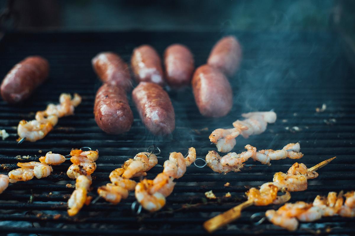 Bratwurst and shrimp skewers on the bbq