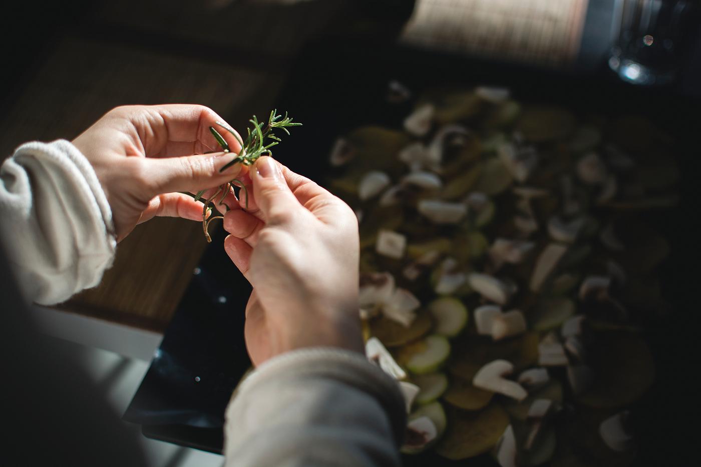Hands holding rosemary Hands holding rosemary