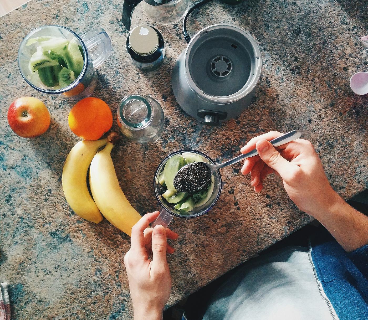Preparing a healthy smoothie Preparing a healthy smoothie