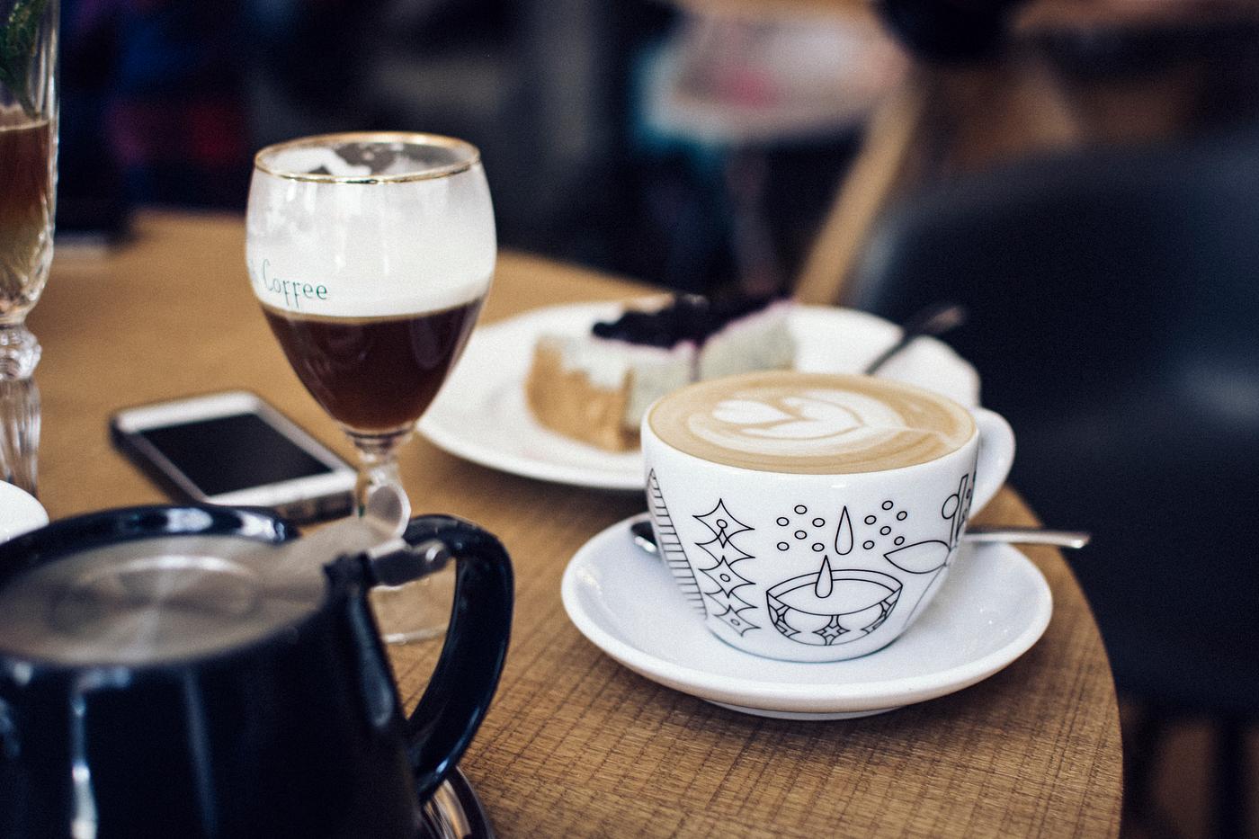 Cappuccino with latte art on a table Cappuccino with latte art on a table