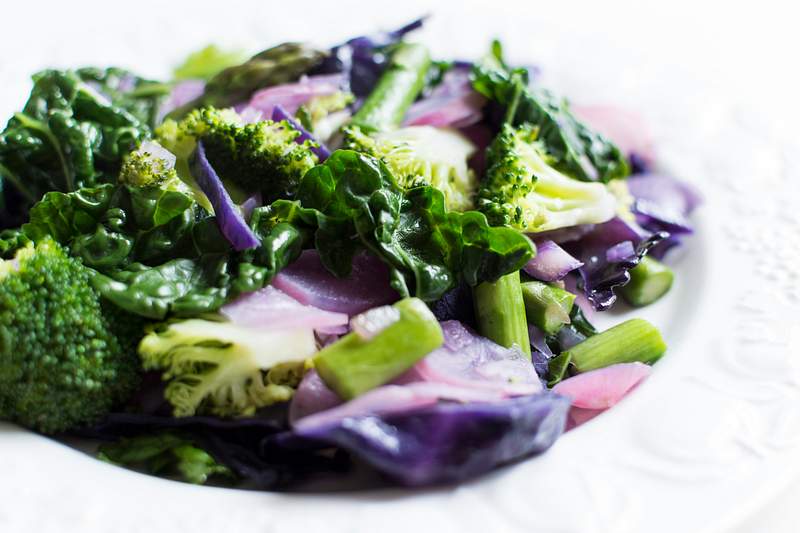 Colorful assortment of seasonal vegetables and vegetable-based dishes