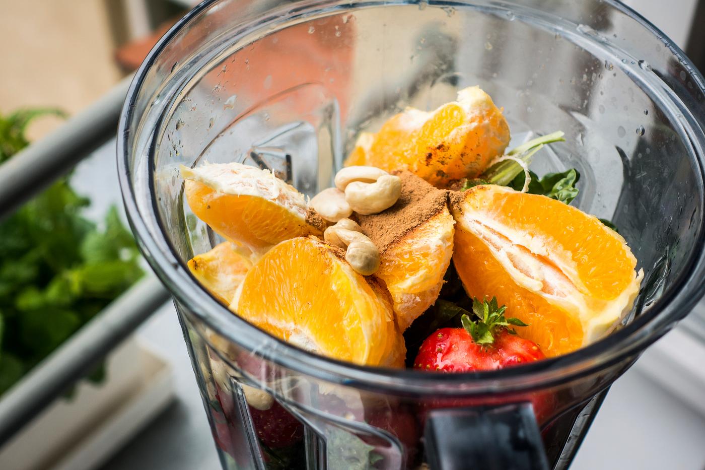 Healthy smoothie ingredients in a blender Healthy smoothie ingredients in a blender