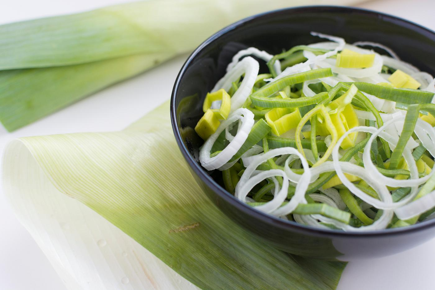 Cut fresh leek in a bowl Cut fresh leek in a bowl