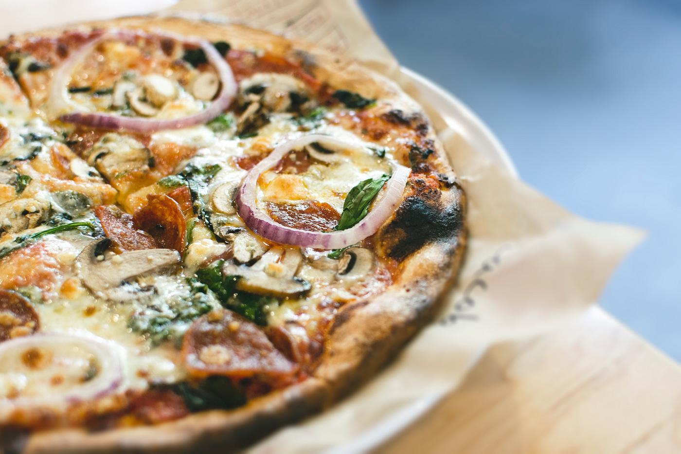 Salami pizza with mushroom and onion food photography Salami pizza with mushroom and onion food photography