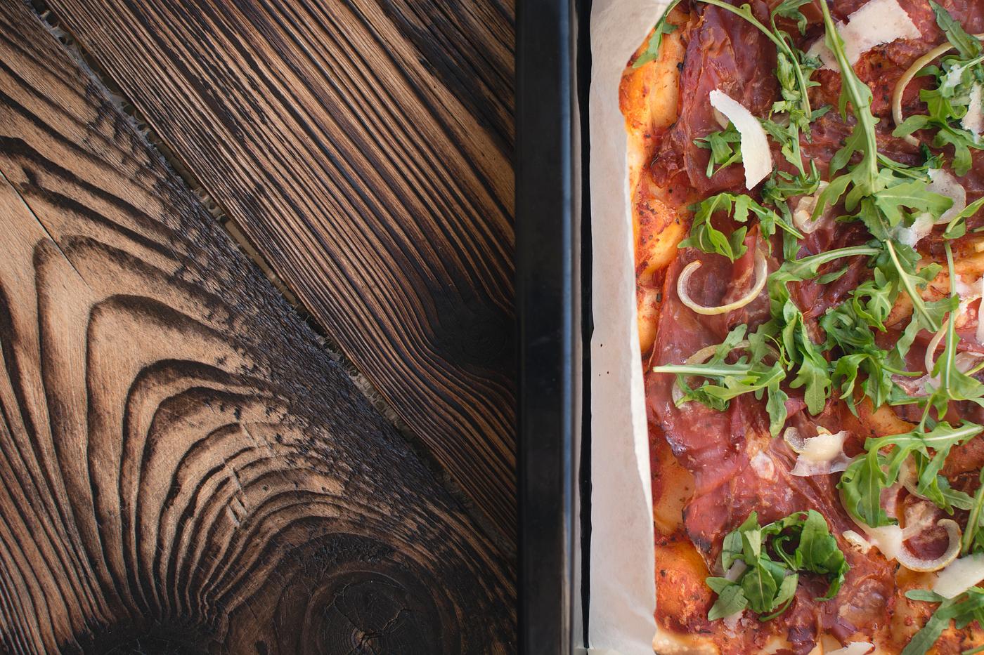 Homemade pizza with prosciutto crudo food photography Homemade pizza with prosciutto crudo food photography
