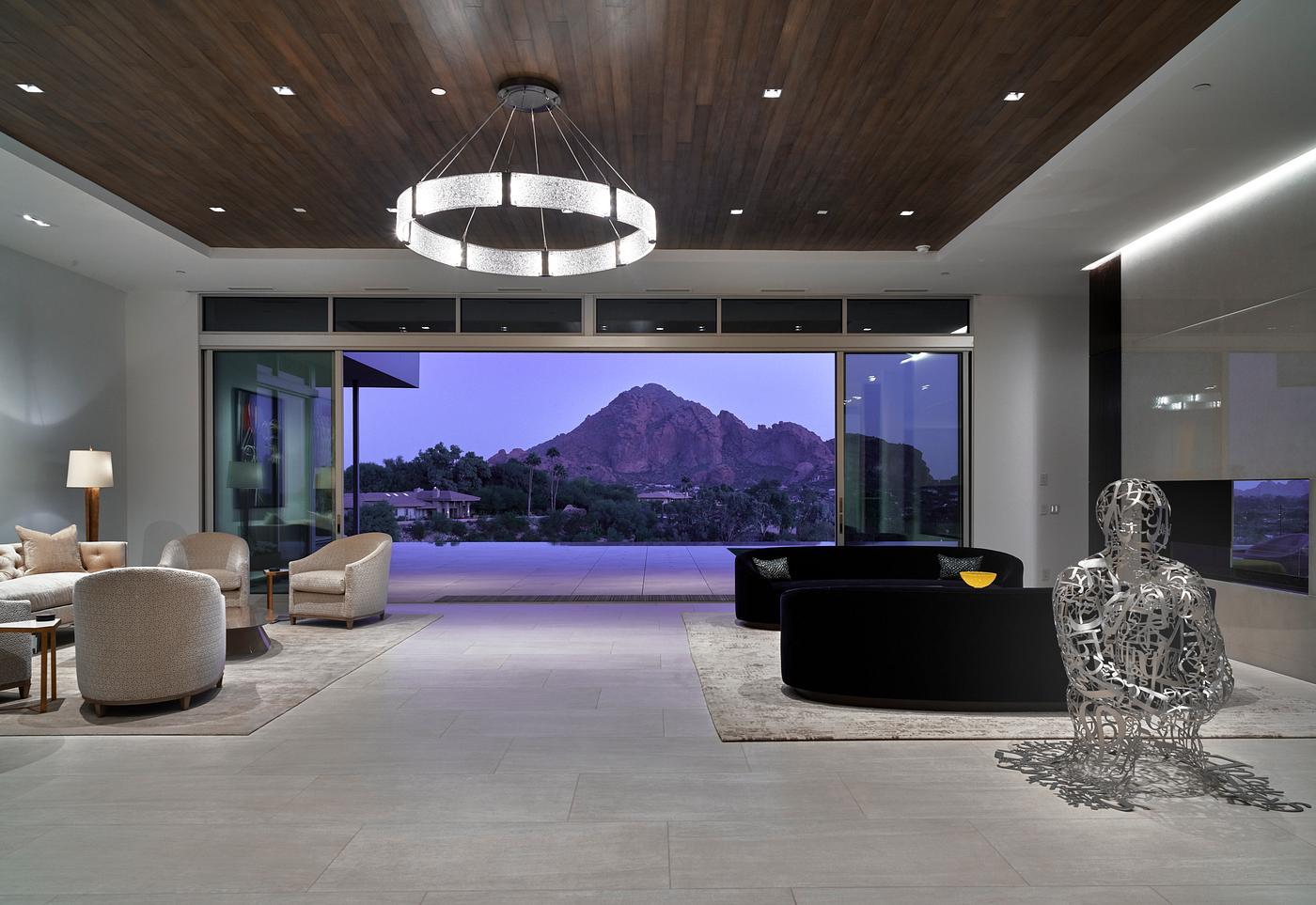 The wide doorway of the living room in an elegant, modernist house in the prosperous community of Paradise Valley, Arizona,... The wide doorway of the living room in an elegant, modernist house in the prosperous community of Paradise Valley, Arizona,...