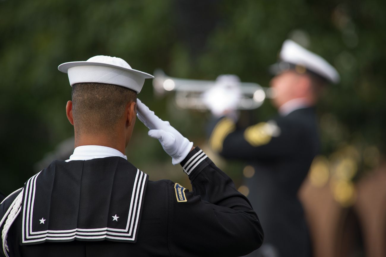A U.S Sailor salutes during the playing of… | Free public domain photo