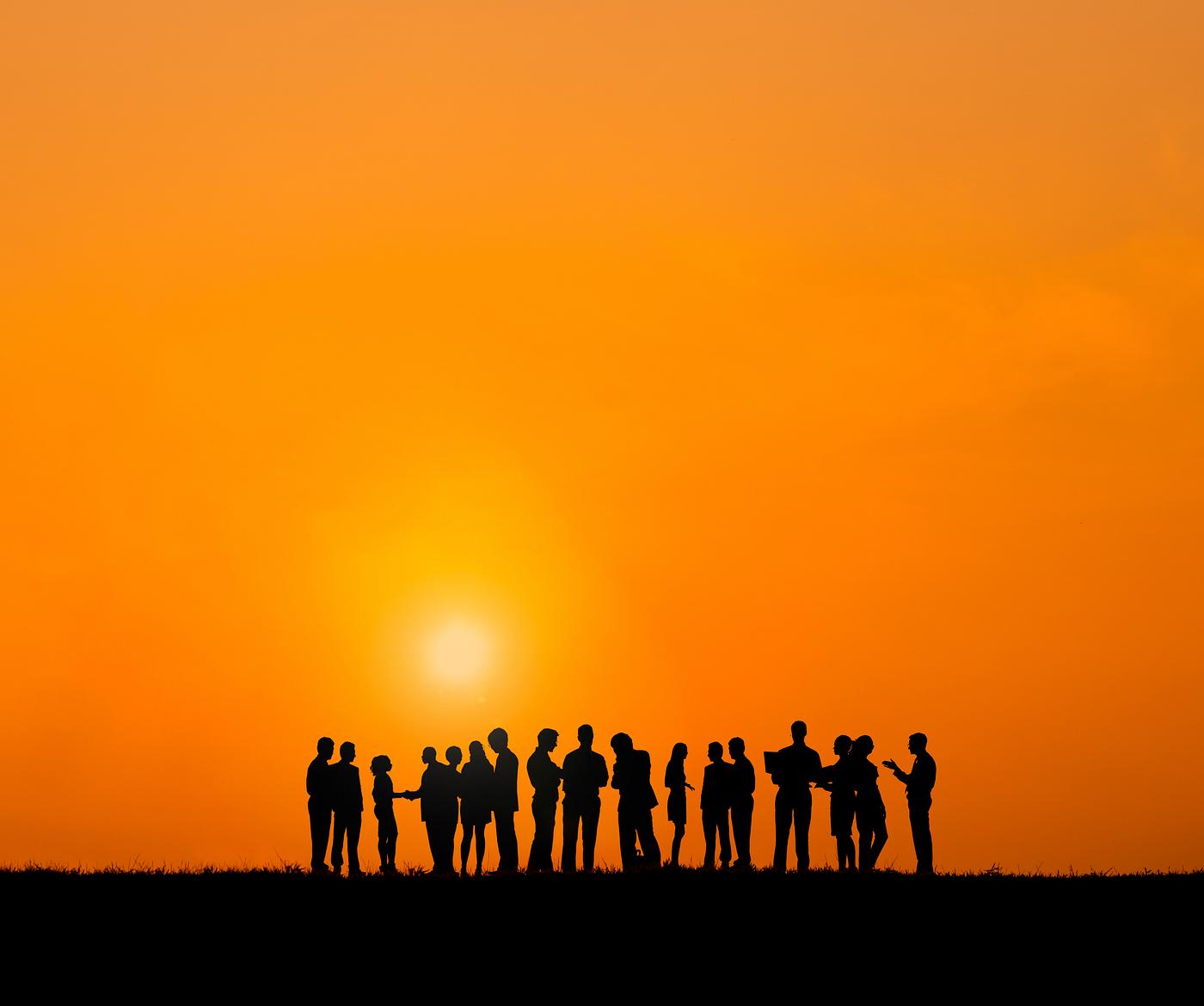 Silhouette of business people in a row communicating at sunset - backlit, business, business people, businessmen,... Silhouette of business people in a row communicating at sunset - backlit, business, business people, businessmen,...