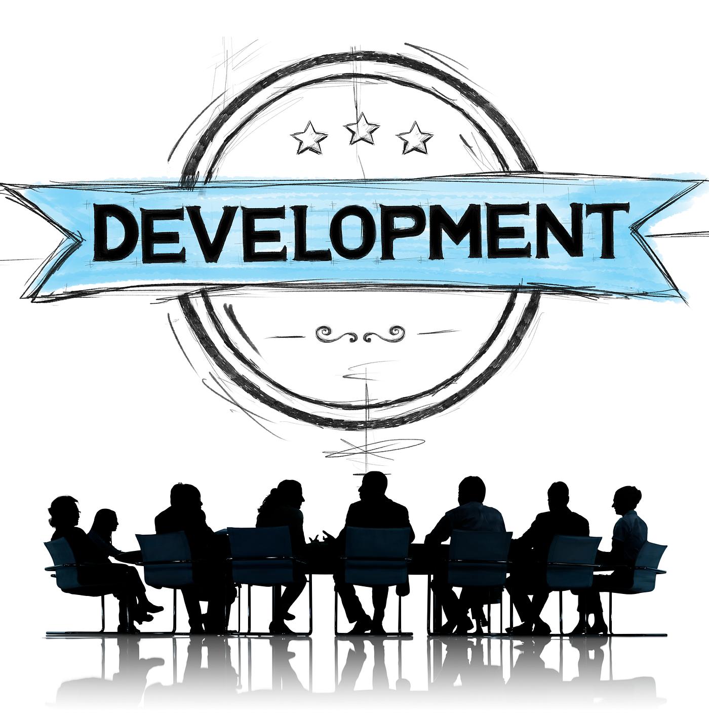 Development banner illustration with silhouette of business people at a meeting table Development banner illustration with silhouette of business people at a meeting table