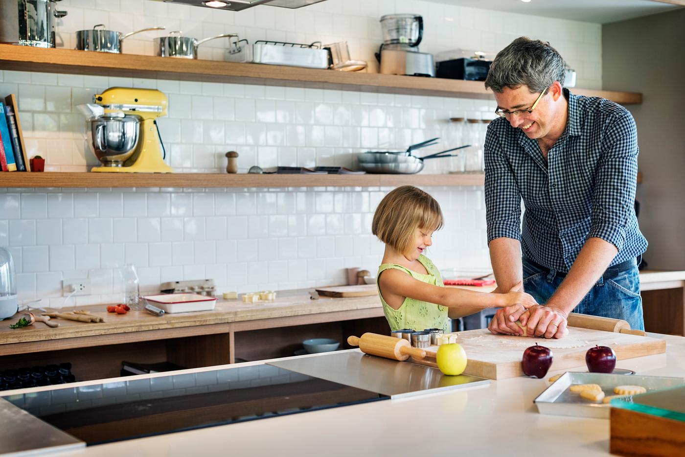 Young caucasian baker - dad, kitchen, family, bakery, activity, american, bake, baker, baking, biscuit, blond, child,... Young caucasian baker - dad, kitchen, family, bakery, activity, american, bake, baker, baking, biscuit, blond, child,...