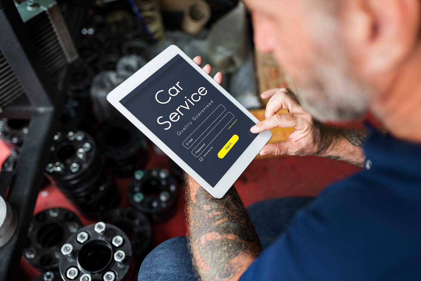 adult, auto, automobile, automotive, business, car, caucasian, computer, digital, engine, fix, fixing, garage, guy, laptop,... adult, auto, automobile, automotive, business, car, caucasian, computer, digital, engine, fix, fixing, garage, guy, laptop,...