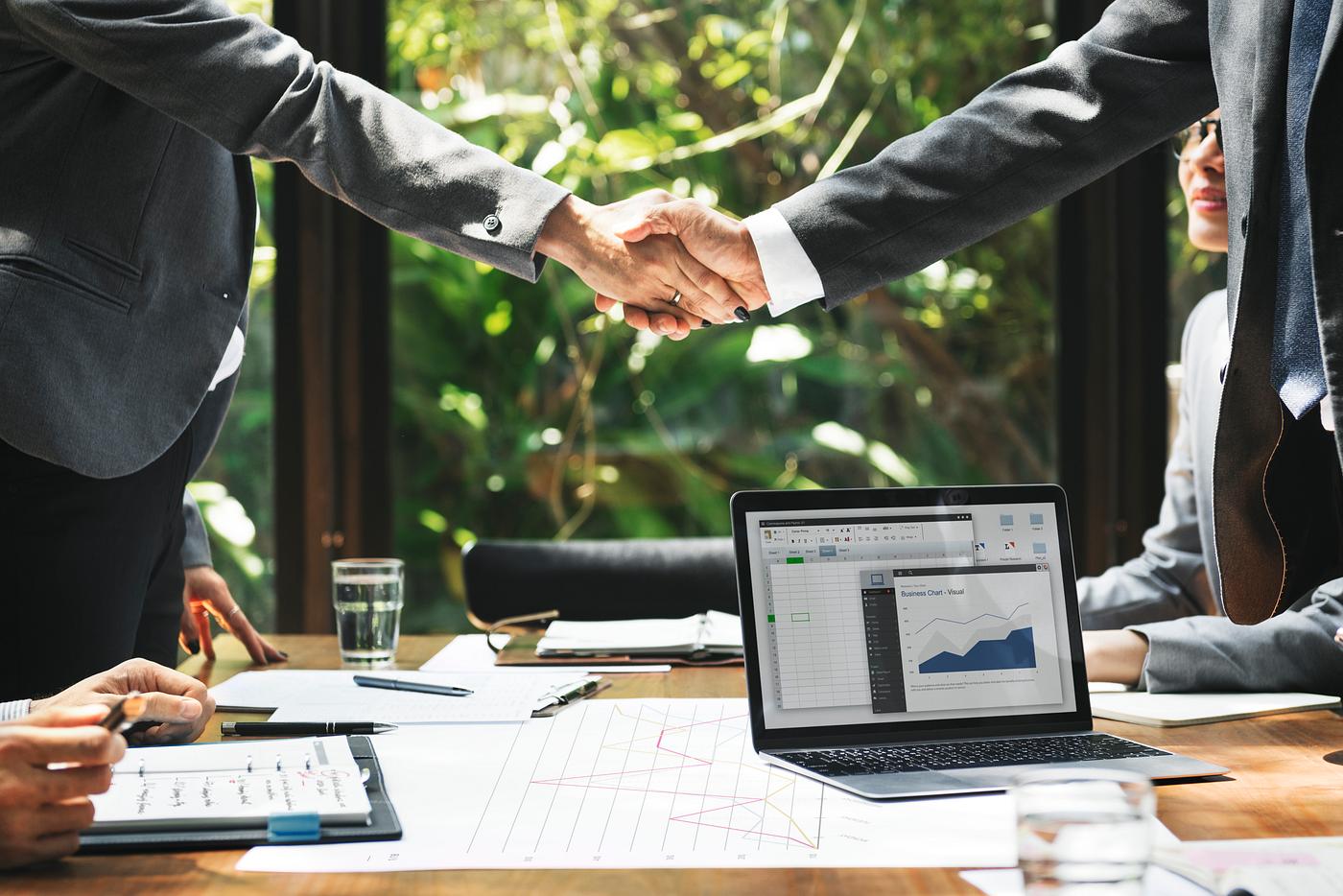 Business handshake - marketing, connection, boardroom, brainstorming, business, business people, business plan, businessmen... Business handshake - marketing, connection, boardroom, brainstorming, business, business people, business plan, businessmen...
