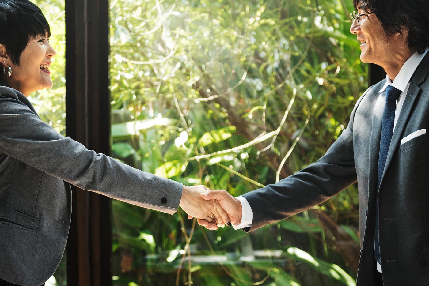 Business handshake in Asia - marketing, asian, asian ethnicity, boardroom, brainstorming, business, business people,... Business handshake in Asia - marketing, asian, asian ethnicity, boardroom, brainstorming, business, business people,...
