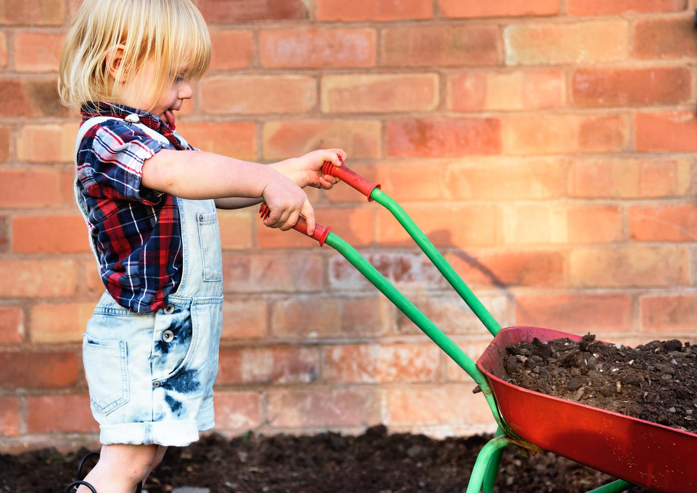 Kid in the garden Kid in the garden