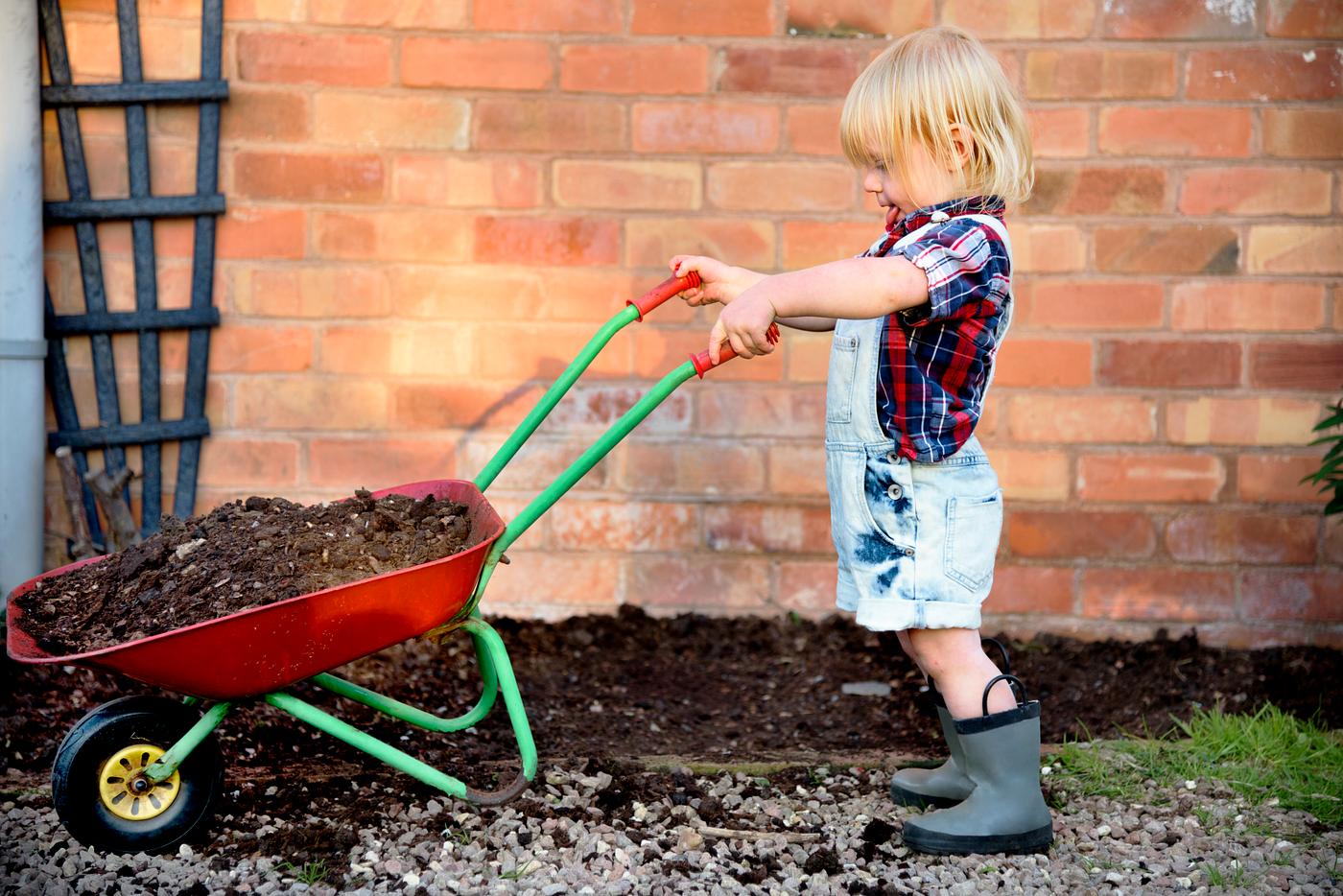 Kid in the garden Kid in the garden