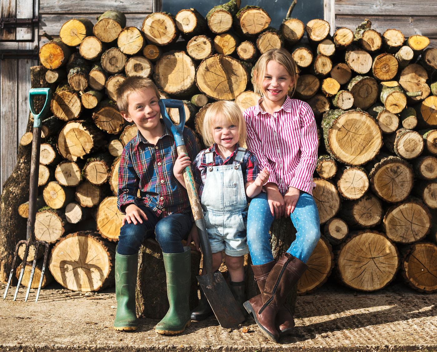 young farmers family - farmer, gardener, sister, wood, brother, cheerful, child, children, chopped, countryside, cut, family... young farmers family - farmer, gardener, sister, wood, brother, cheerful, child, children, chopped, countryside, cut, family...