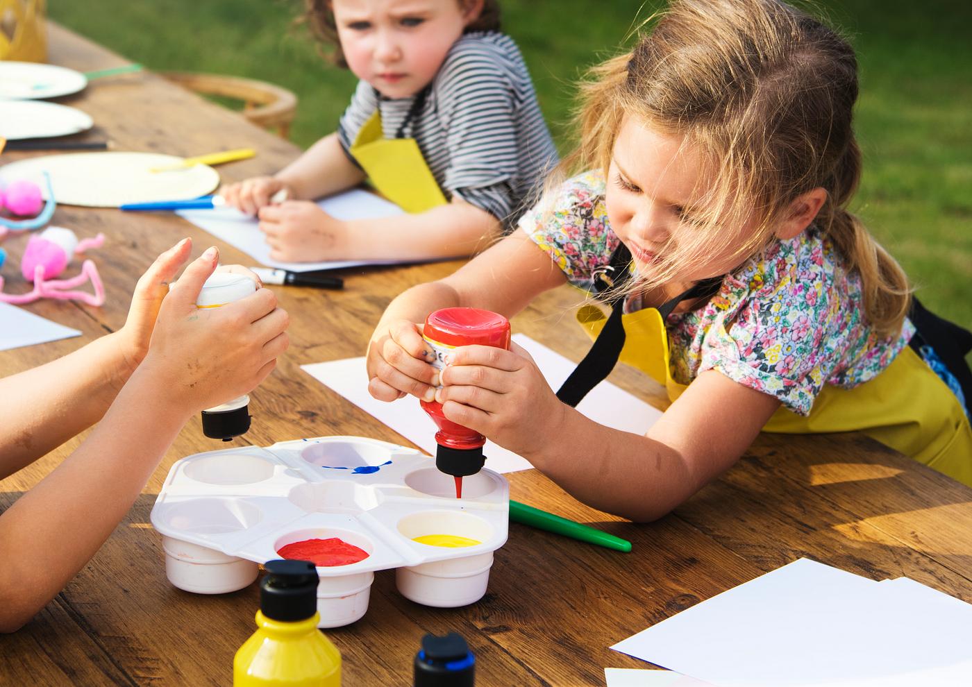 Group of young kids enjoying artworks