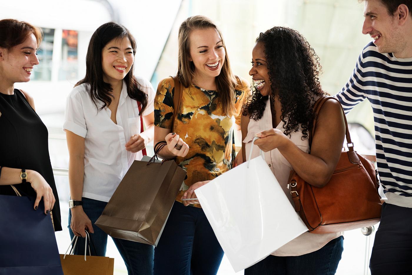 Group of friends shopping in a mall - shopping, fashion, african, african american, asian, bags, buy, buying, carry, casual... Group of friends shopping in a mall - shopping, fashion, african, african american, asian, bags, buy, buying, carry, casual...