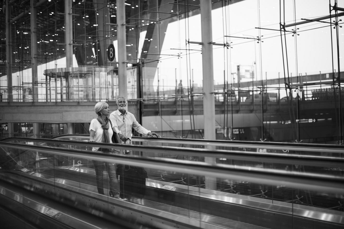 airport, bag, black and white, casual, caucasian, couple, elderly, escalator, grayscale, holiday, husband, love, luggage,... airport, bag, black and white, casual, caucasian, couple, elderly, escalator, grayscale, holiday, husband, love, luggage,...