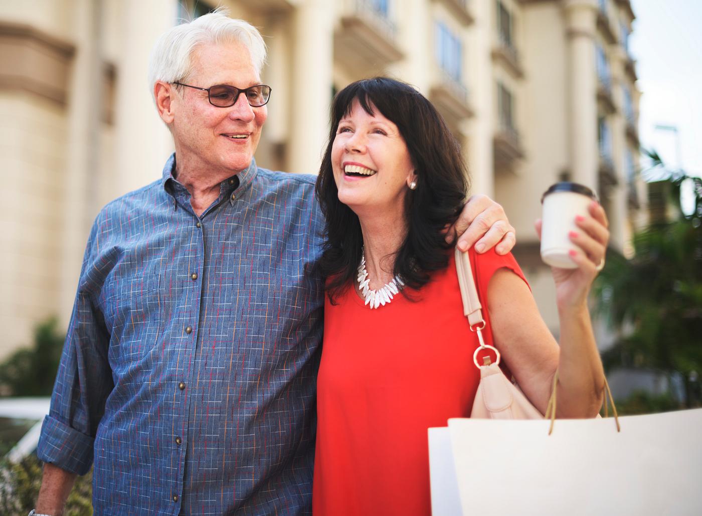 Mature couple enjoying shopping around Mature couple enjoying shopping around