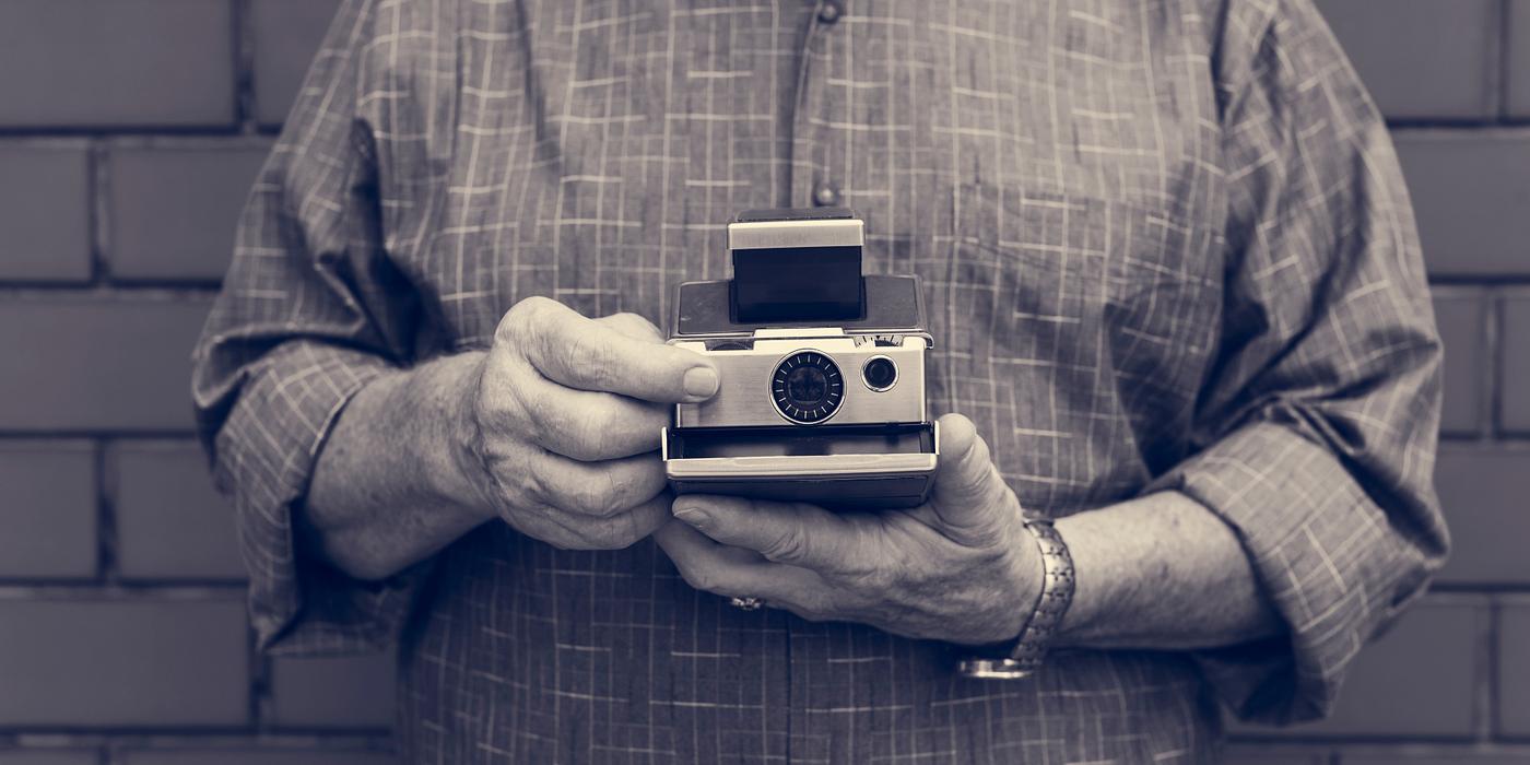 holding, brick, camera, hobby, leisure, fun, photography, photographer, wall, man holding, brick, camera, hobby, leisure, fun, photography, photographer, wall, man