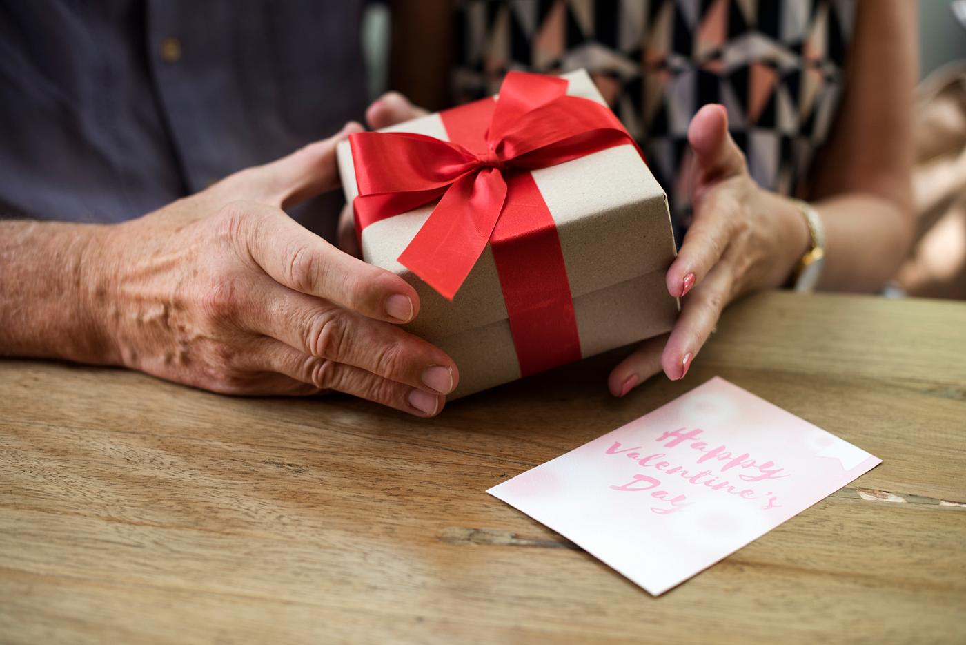 adult, bow, box, card, casual, caucasian, celebration, closeup, couple, cropped, day, female, gesture, gift, giving, guy,... adult, bow, box, card, casual, caucasian, celebration, closeup, couple, cropped, day, female, gesture, gift, giving, guy,...