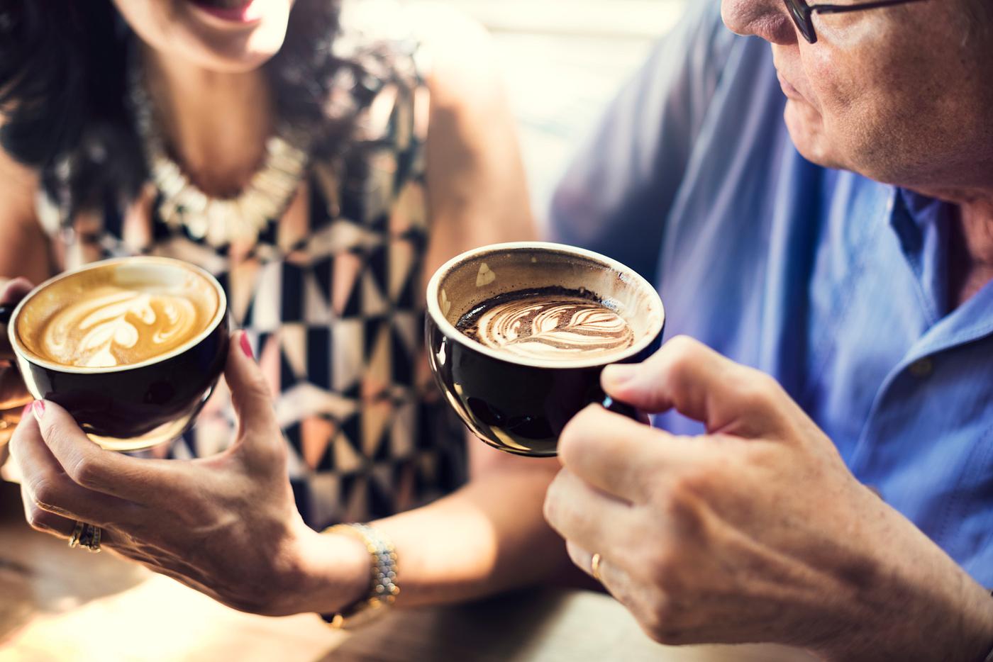 Mature couple drinking coffee together - adult, cafe, caffeine, casual, chat, closeup, coffee, coffee shop, connection,... Mature couple drinking coffee together - adult, cafe, caffeine, casual, chat, closeup, coffee, coffee shop, connection,...