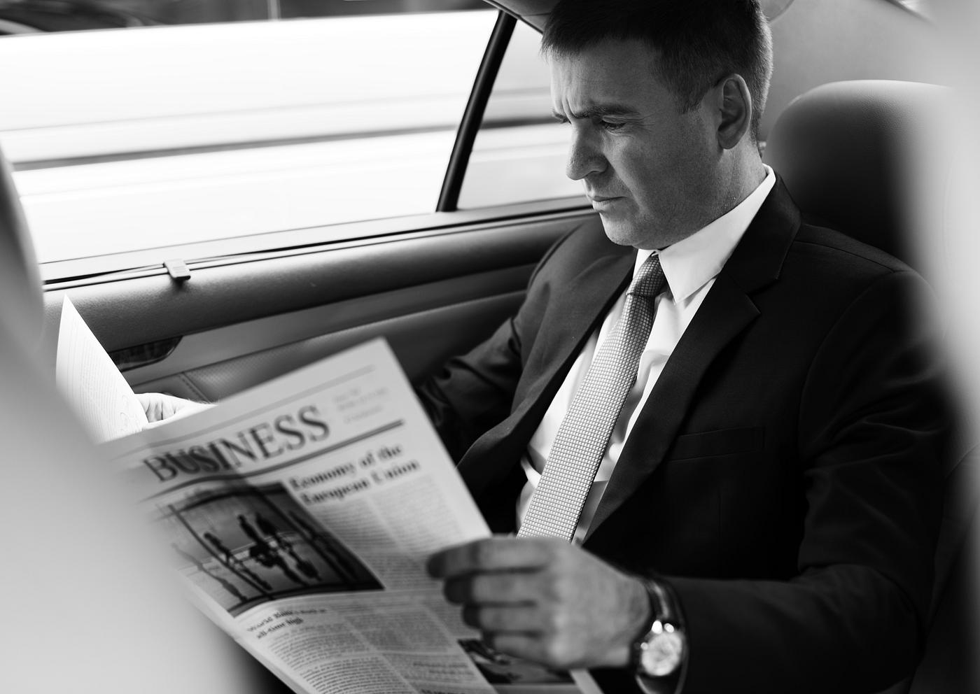 Businessman reading the newspaper - newspaper, adult, backseat, business, businessman, businessmen, busy, car, career,... Businessman reading the newspaper - newspaper, adult, backseat, business, businessman, businessmen, busy, car, career,...