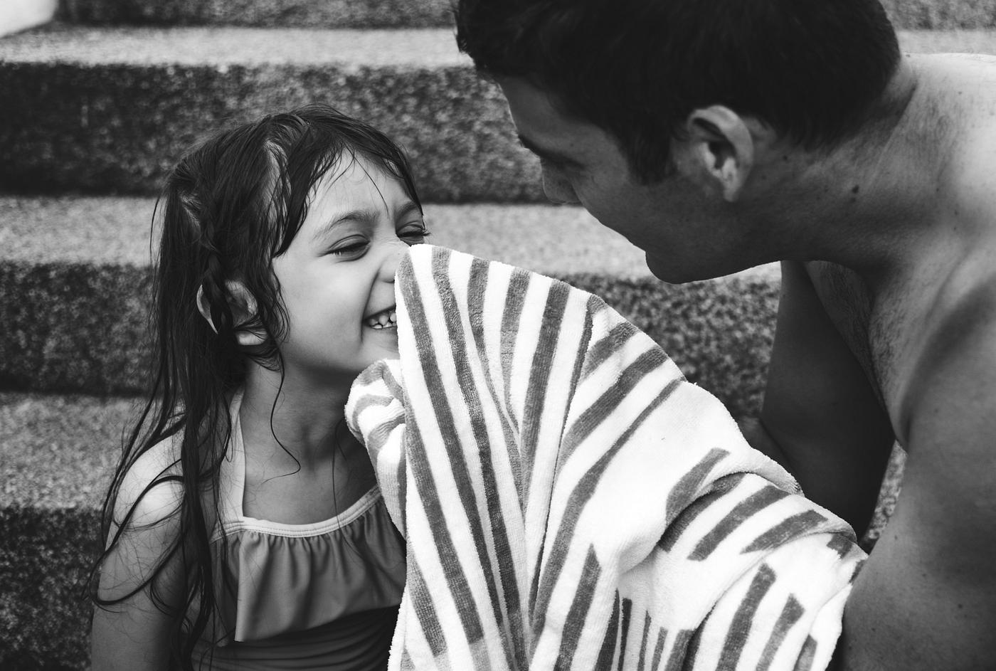 Dad drying his daughter with a towel Dad drying his daughter with a towel