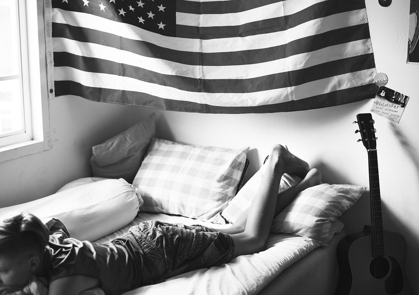 Young caucasian boy lying on bed grayscale - home, relax, house, teenage, caucasian, american, alone, man, lying, bed, young... Young caucasian boy lying on bed grayscale - home, relax, house, teenage, caucasian, american, alone, man, lying, bed, young...