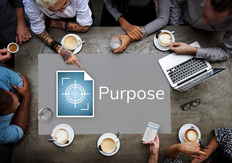 How To Create Strong Mission And Vision Statements For Your Restaurant And Takeaway 2 Workers working on billboard on table network graphic overlay